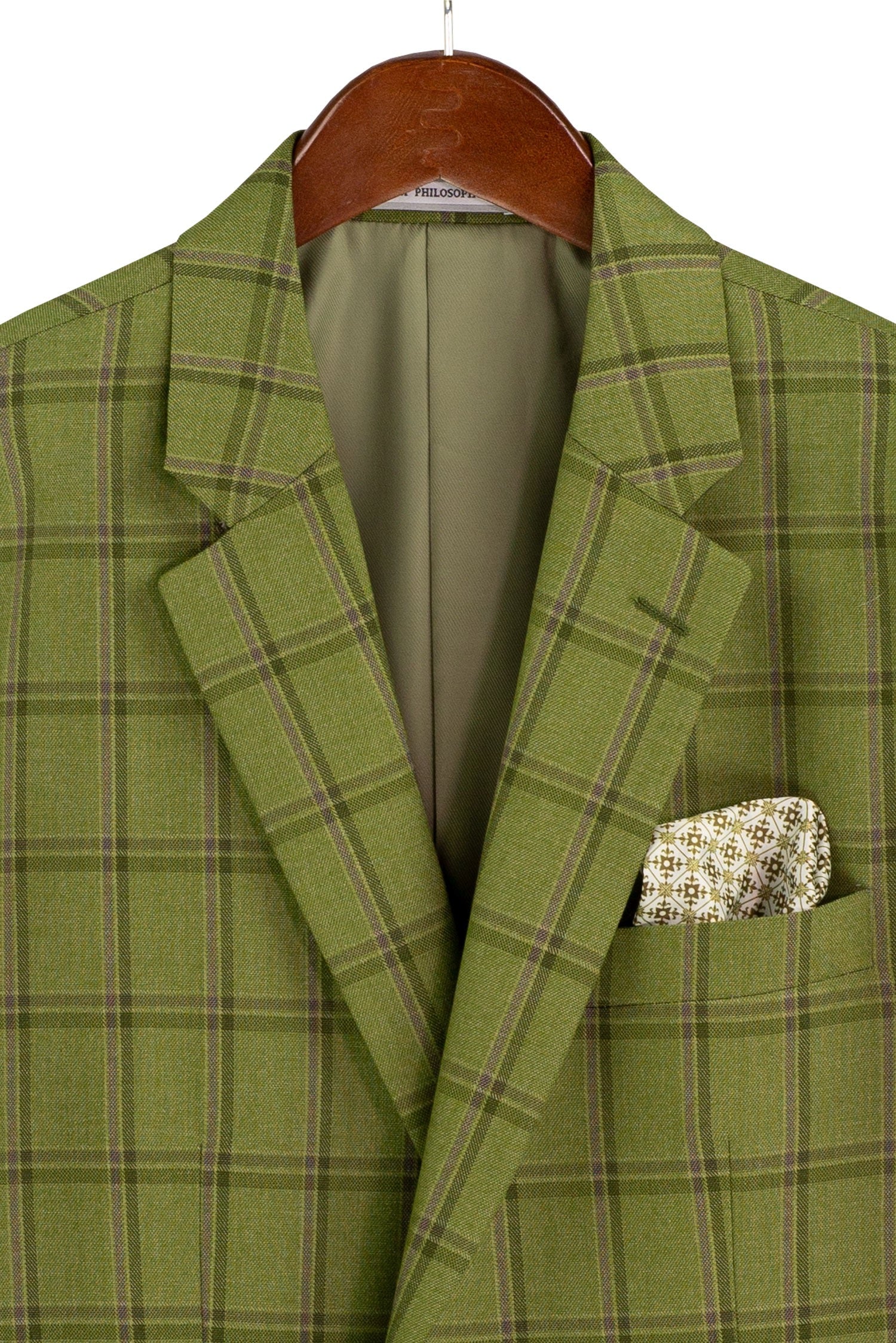 Green plaid suit jacket with a hanger on a white background