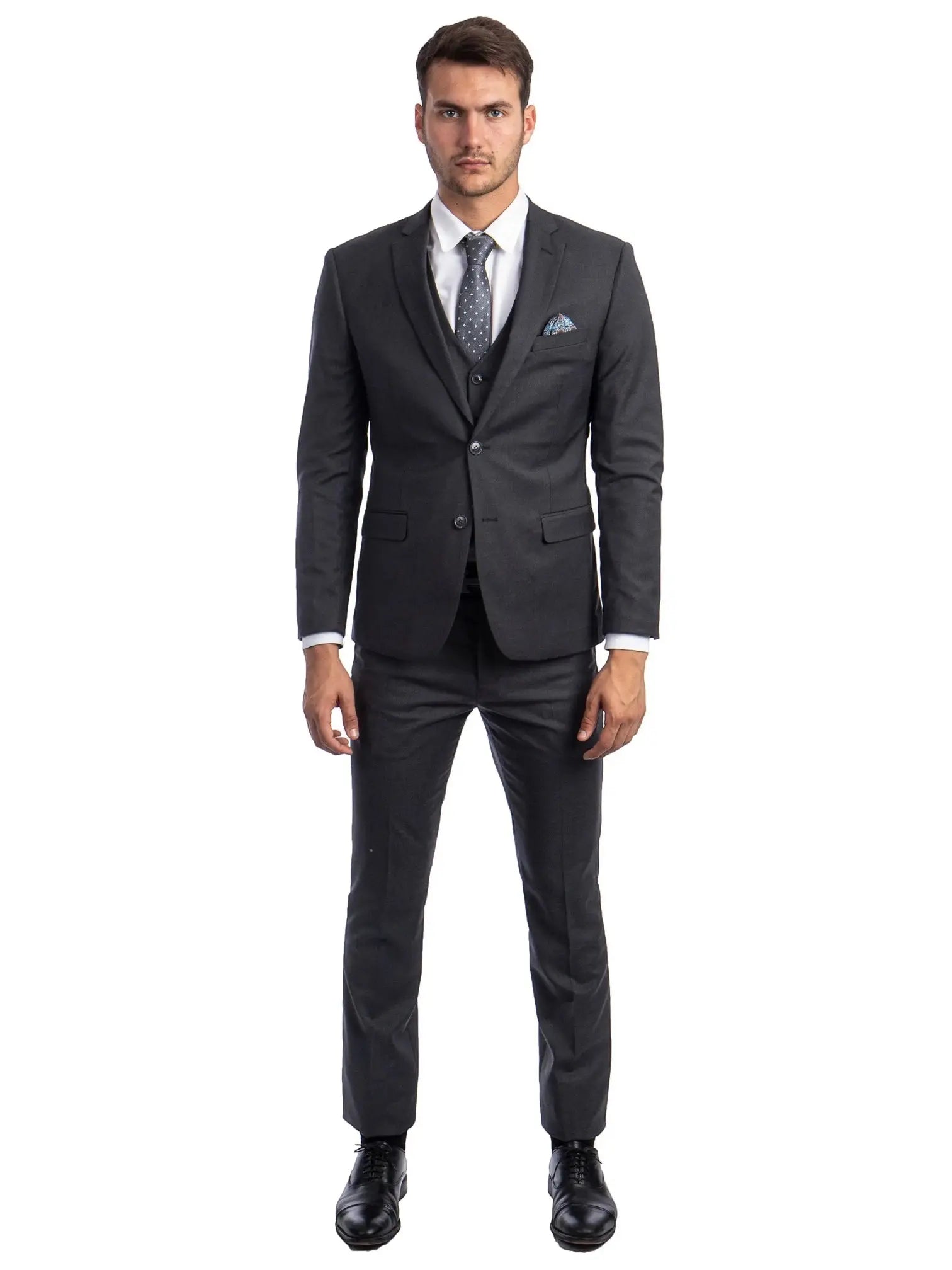 Model wearing a charcoal grey M & R Clothing skinny-fit 3-piece suit with a white shirt and patterned tie.