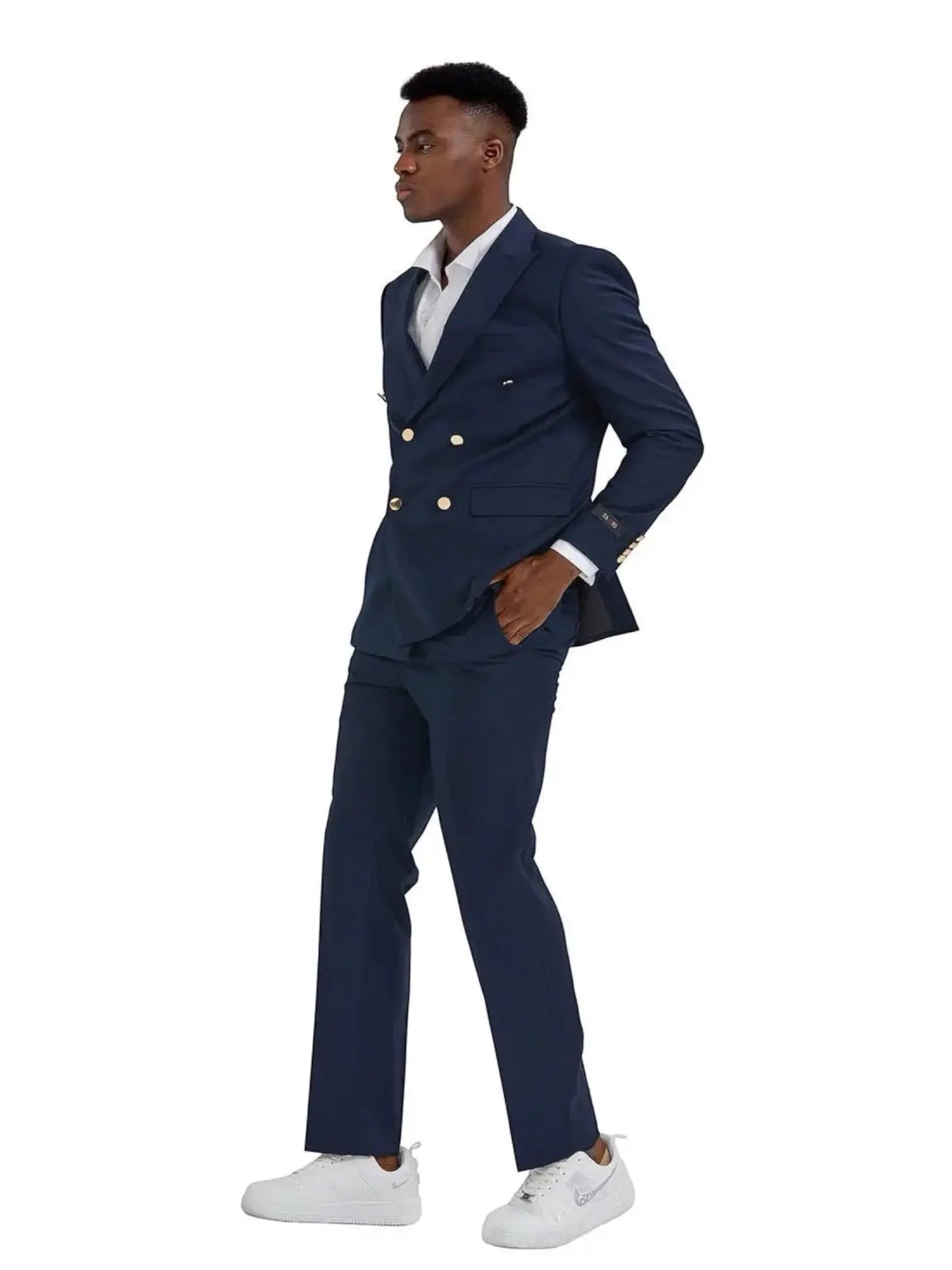 M & R Clothing navy double breasted suit with peak lapel and gold buttons worn by a man in white sneakers