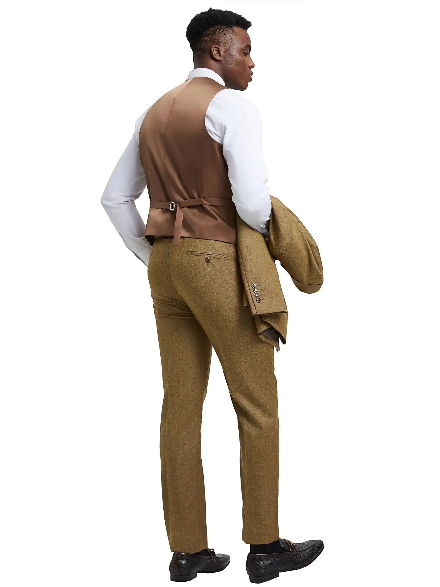Model wearing M & R Clothing Stacy Adams 3-piece sharkskin suit in tan with a brown vest, back view