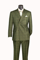 An olive green double-breasted suit with a subtle windowpane plaid pattern, displayed on a mannequin torso with a cream shirt and patterned tie.