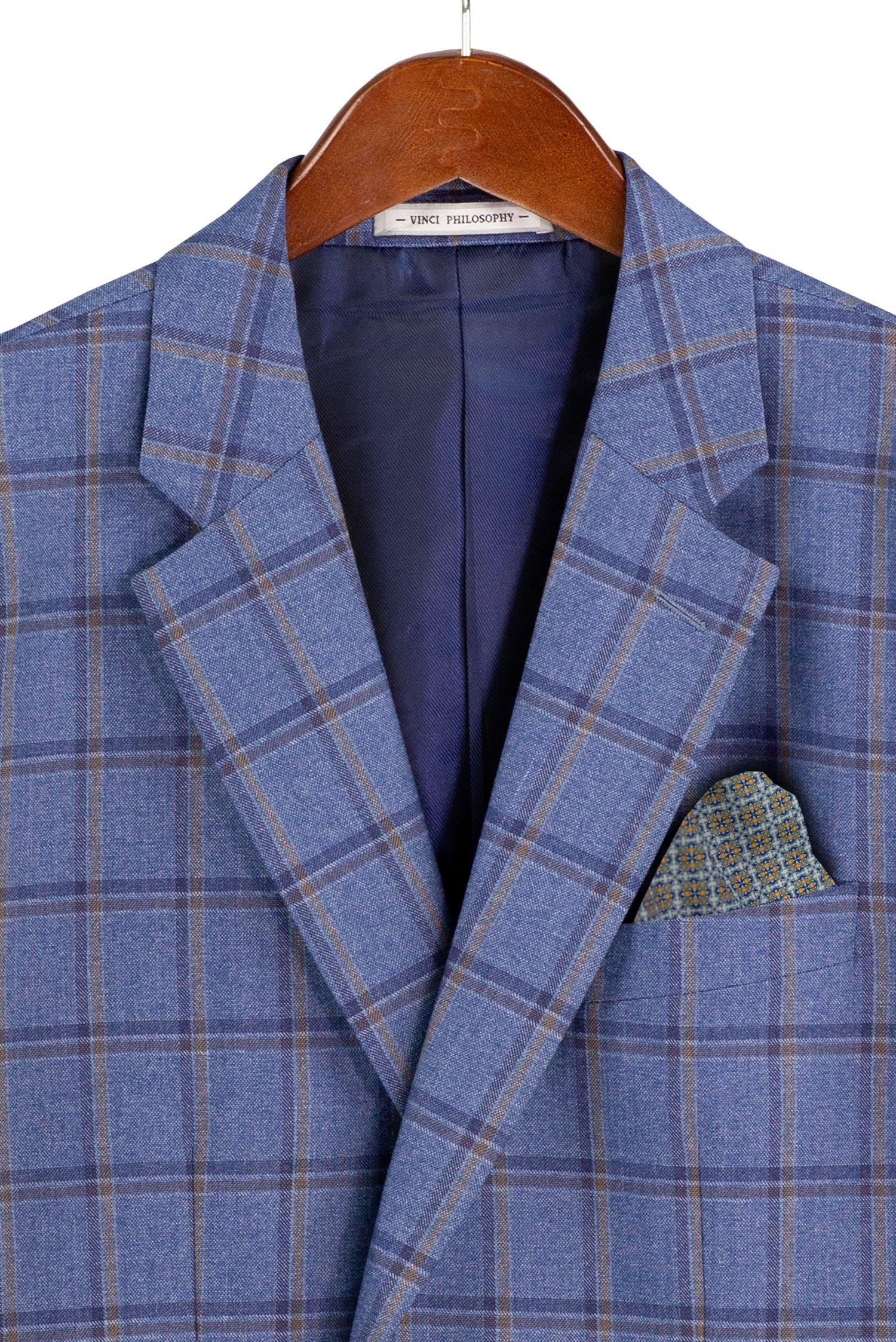 Blue checkered suit jacket on a hanger with a white background