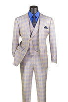 Plaid suit with a blue shirt and tie on a mannequin against a white background