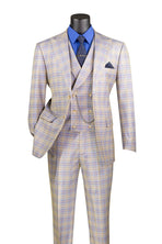 Plaid suit with a blue shirt and tie on a mannequin against a white background
