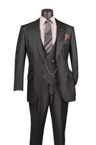 A three-piece dark gray suit displayed on a mannequin, styled with a light pink dress shirt, a gray and black striped tie, and a matching pocket square.
