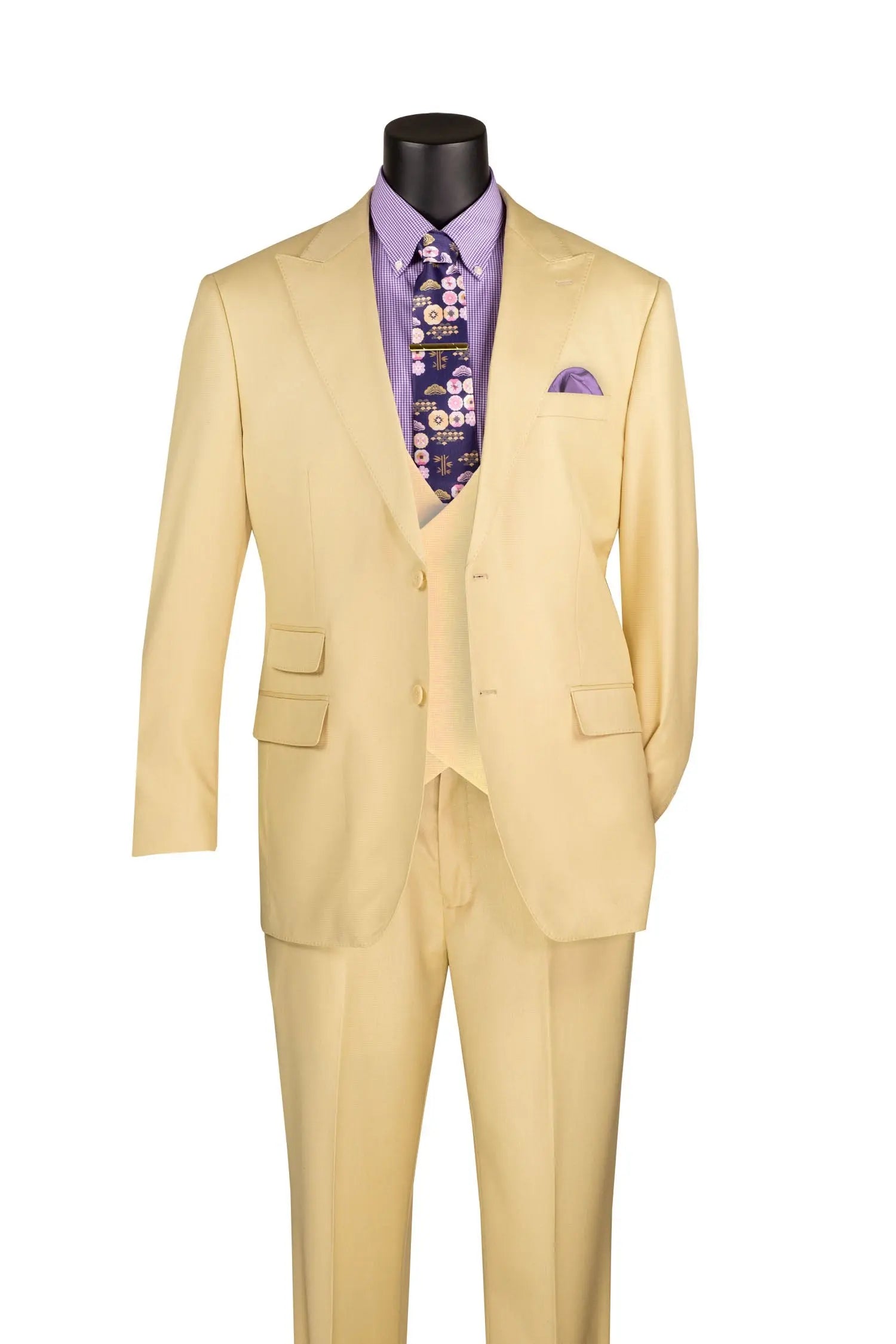 Beige suit with a purple shirt and floral tie on a mannequin against a white background