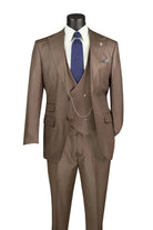 A three-piece brown suit displayed on a black mannequin torso, styled with a white dress shirt, a blue patterned tie, and a matching pocket square against a plain white background.