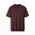A short-sleeve crewneck knit sweater in a deep burgundy color, displayed flat against a clean white background.