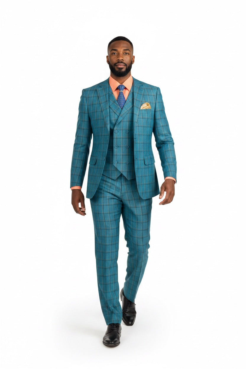 A man wearing a teal blue and orange windowpane plaid three-piece suit, including a jacket, vest, and trousers, styled with a peach shirt, blue patterned tie, and a yellow pocket square, walking against a white background.