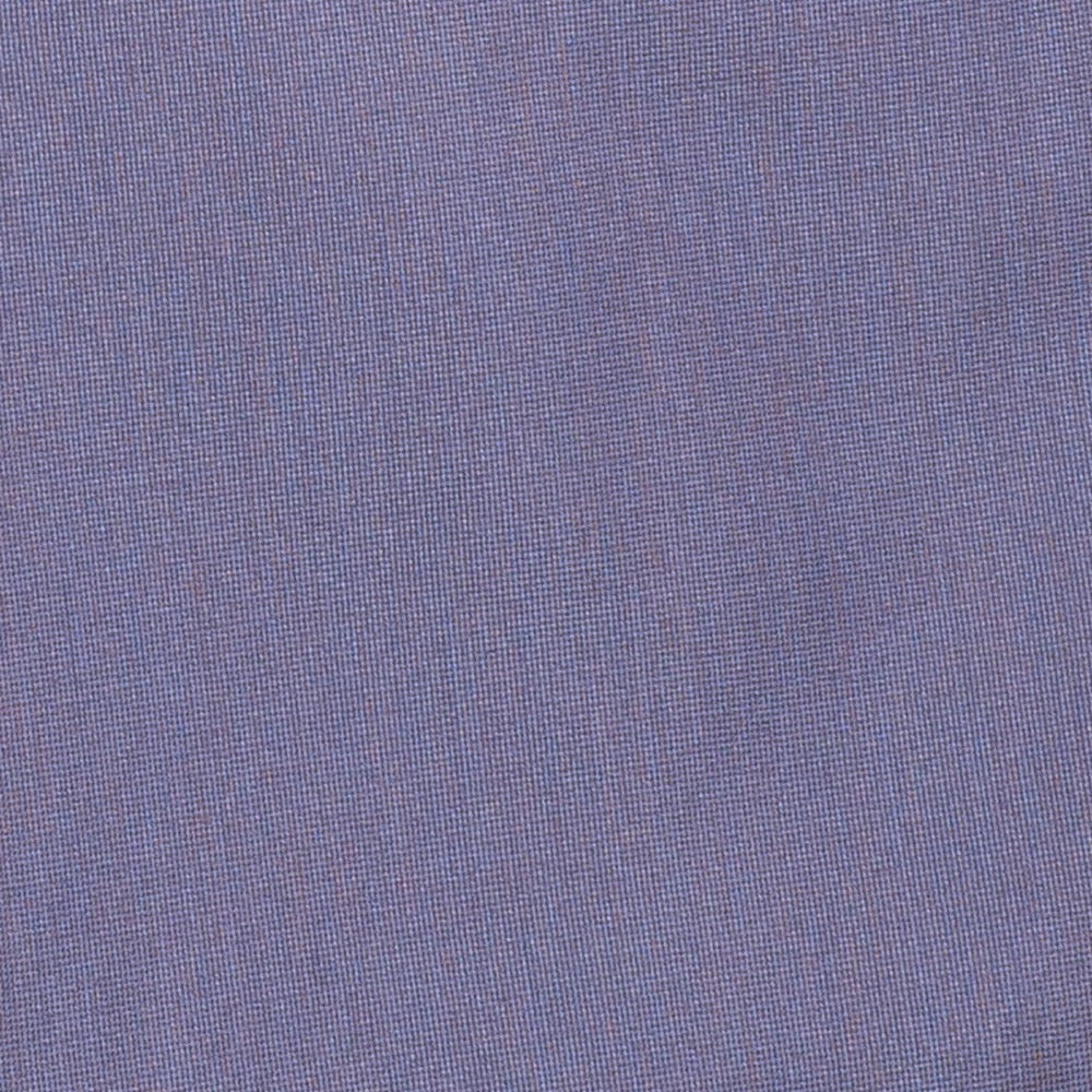 A close-up of a textured fabric with a fine woven pattern in a muted periwinkle or dusty purple-blue color.