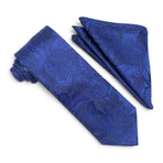 A matching necktie and pocket square set in a rich royal blue color, both featuring an intricate paisley pattern, displayed on a clean white background.