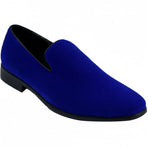 Blue velvet loafer shoe on a white background