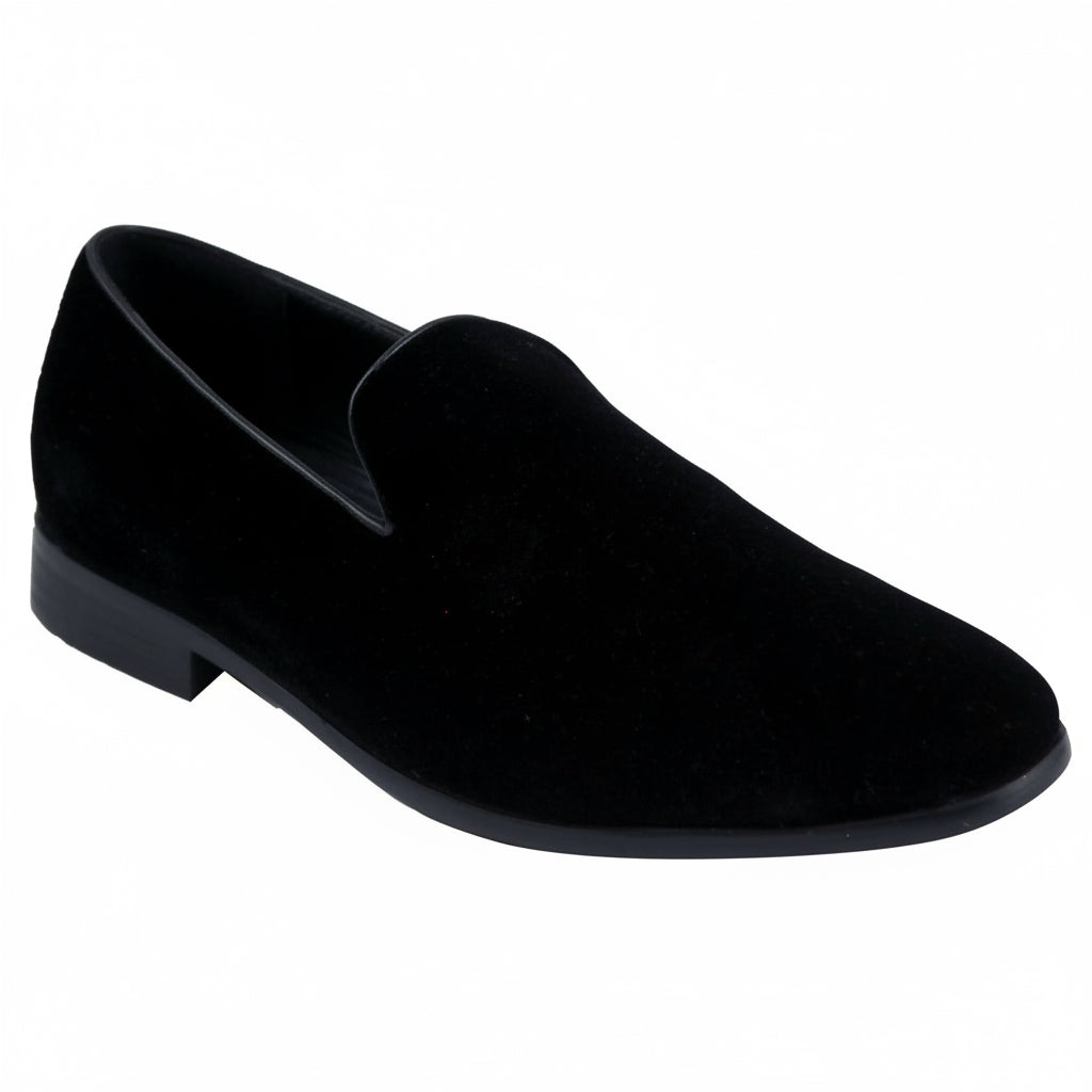 Black suede loafer shoe on a white background