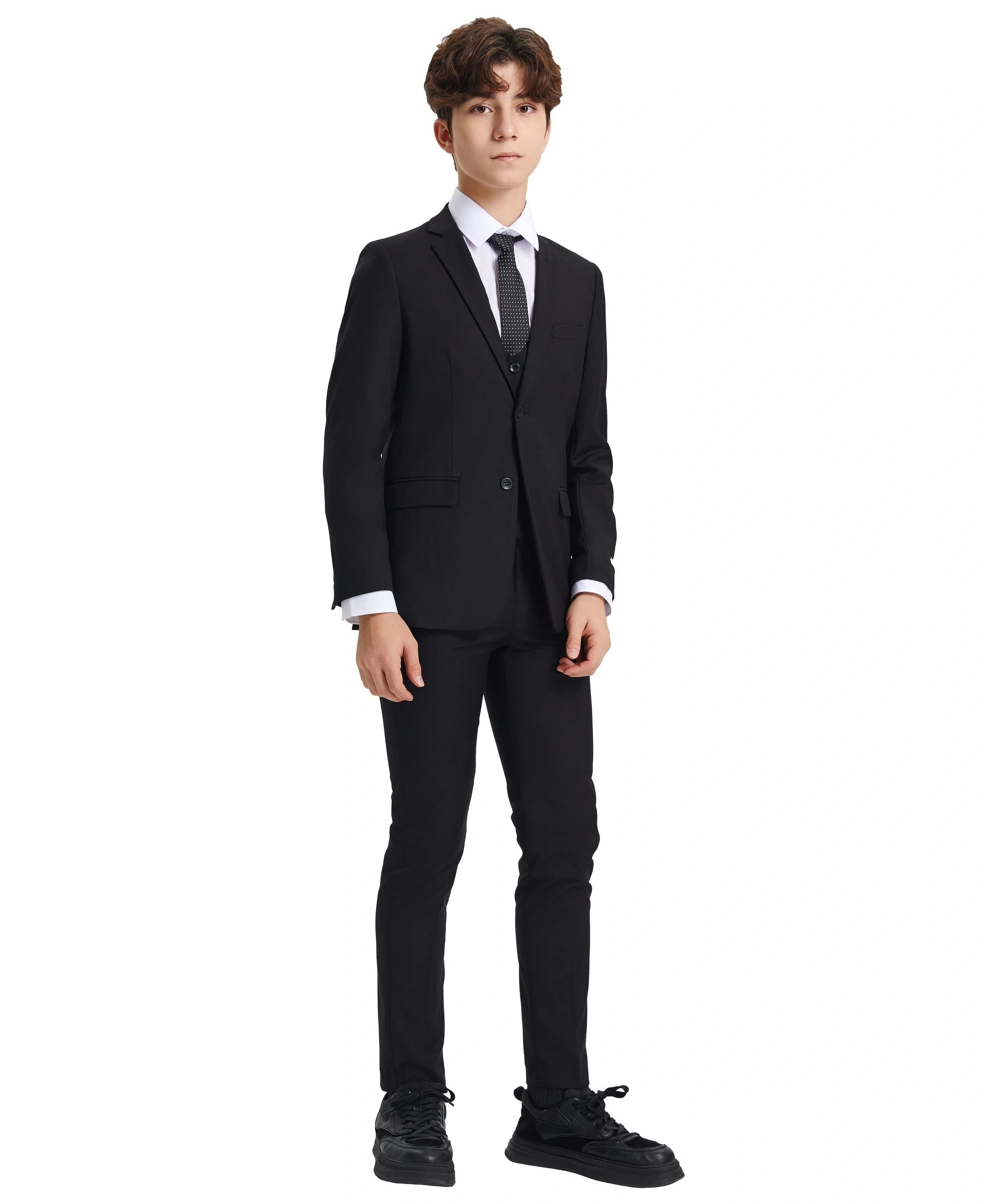 Person wearing a black suit on a white background