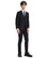Person wearing a black suit on a white background