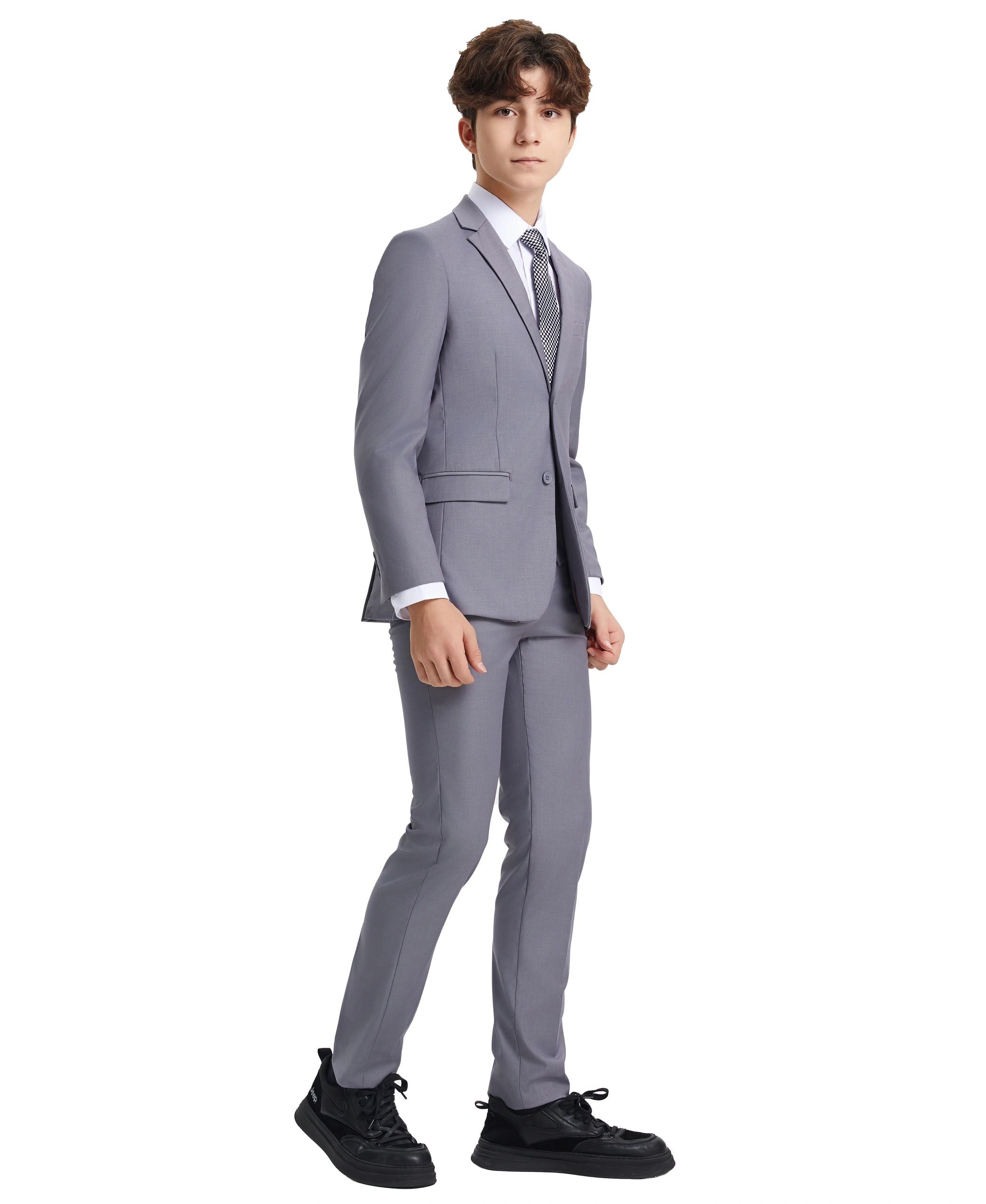 Person wearing a gray suit on a white background