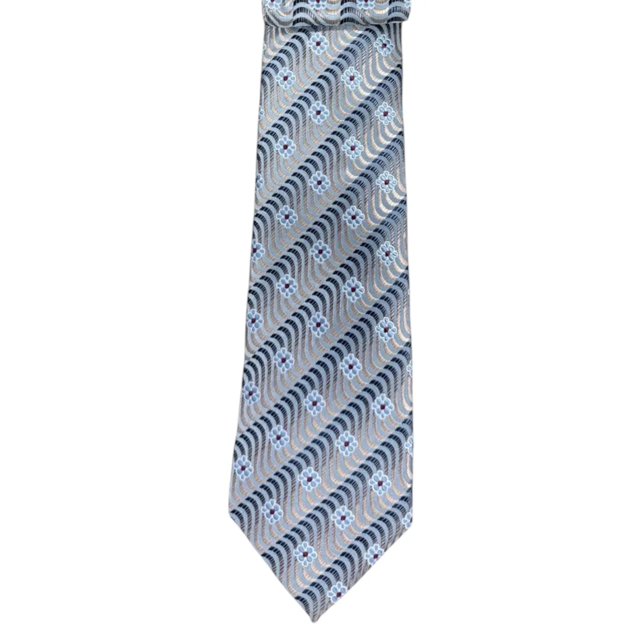 M & R Clothing Augustino tie featuring a light blue and grey floral and geometric woven pattern on lustrous fabric.