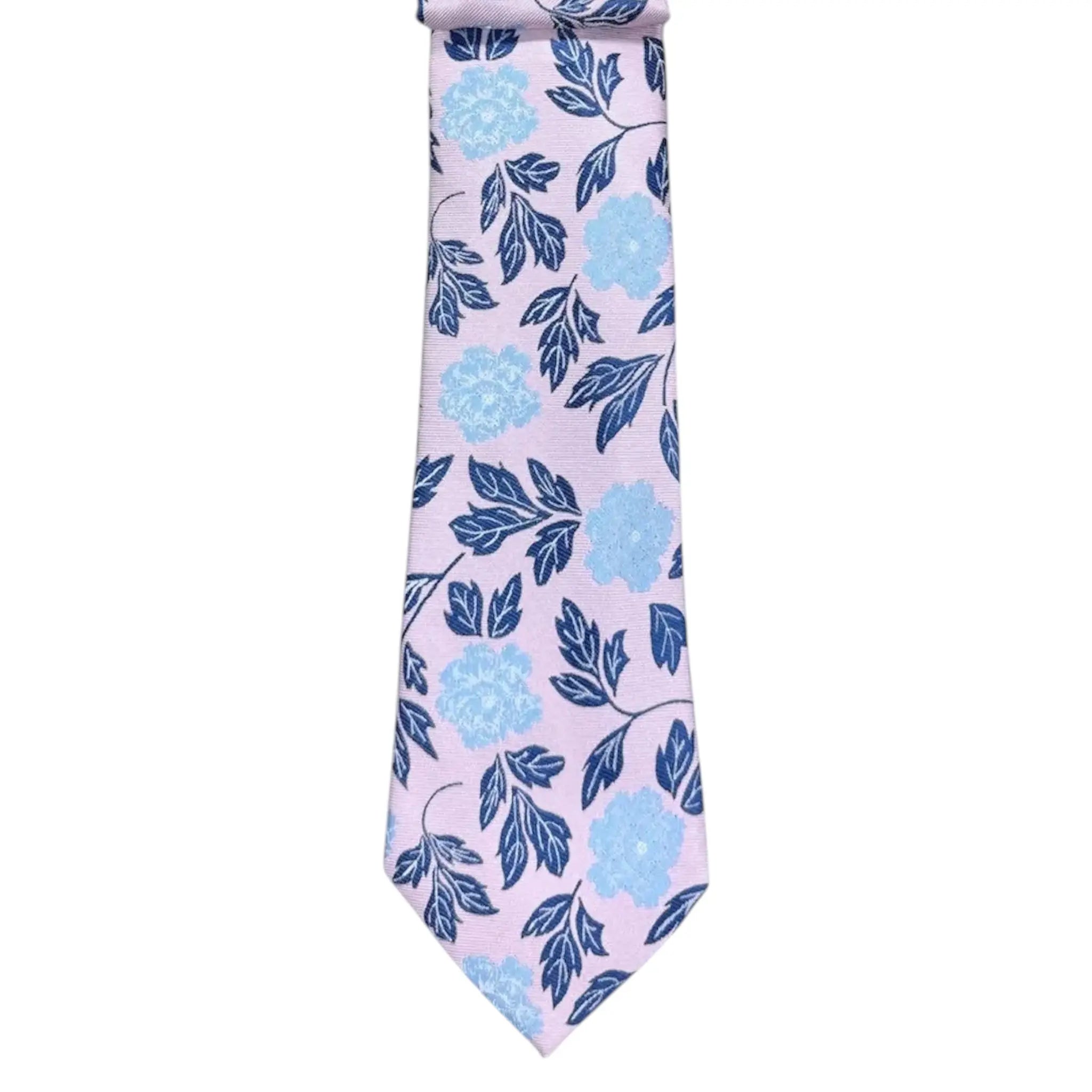 M & R Clothing Augustino tie featuring a light pink background with blue floral and leaf patterns in woven fabric