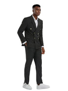 Model wearing a M & R Clothing black double-breasted slim fit suit with peak lapels and gold buttons.
