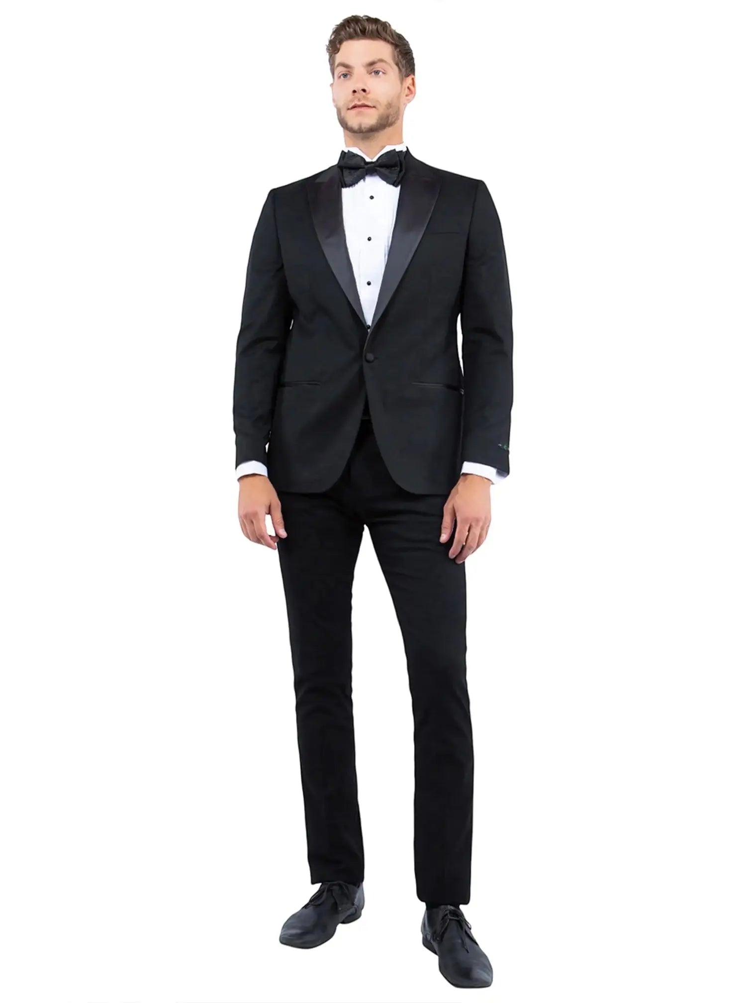 M & R Clothing tailored-fit black tuxedo jacket with satin peak lapels worn by a man with a bowtie