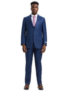 Model wearing a blue M & R Clothing Stacy Adams sharkskin 3-piece suit with a white shirt and pink tie