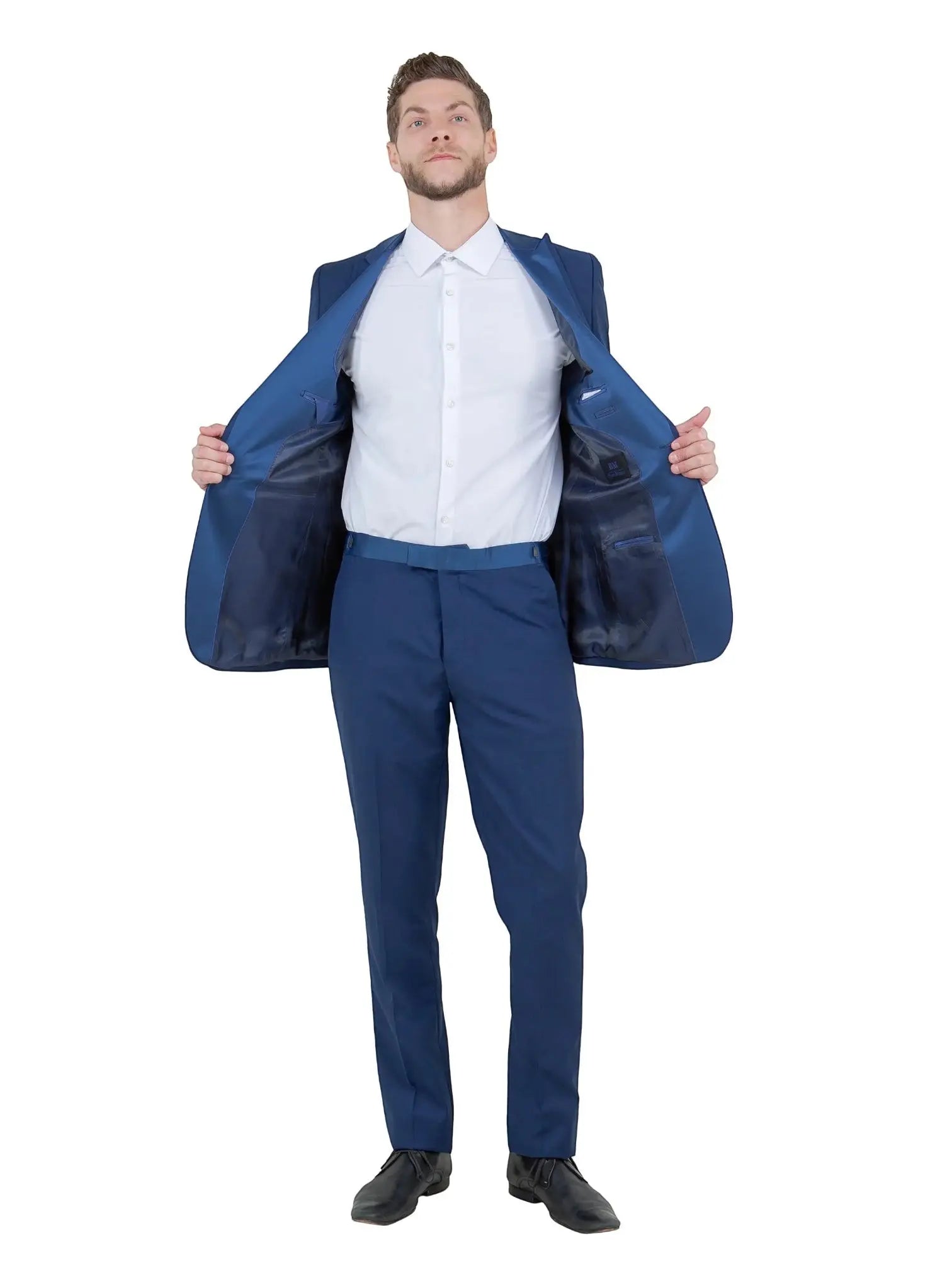 M & R Clothing Bryan Michaels blue tuxedo jacket with satin peak lapels worn by a man over a white dress shirt