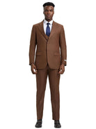Model wearing a brown M & R Clothing Stacy Adams 3-piece sharkskin suit with a white shirt and blue tie