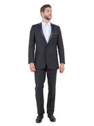 M & R Clothing Bryan Michaels black tuxedo with satin peak lapel worn by a man in a white dress shirt
