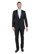 M & R Clothing Bryan Michaels black tuxedo with satin peak lapel worn by a smiling man in a white dress shirt