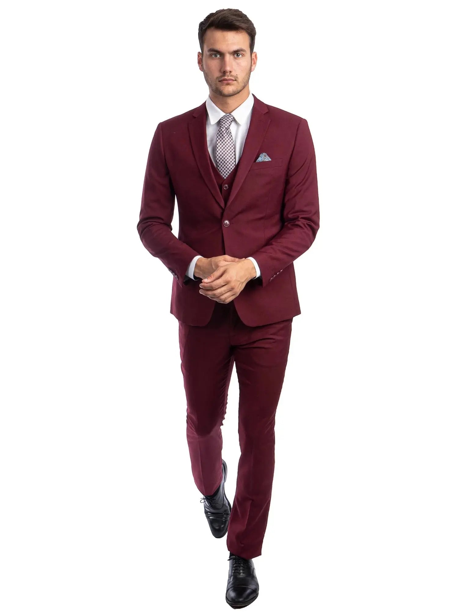 Model wearing a M & R Clothing burgundy skinny-fit 3-piece suit with a white shirt and patterned tie.