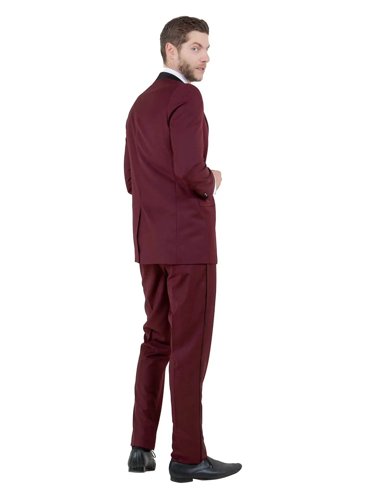 M & R Clothing Bryan Michaels burgundy tuxedo with satin peak lapel worn by a man looking over his shoulder
