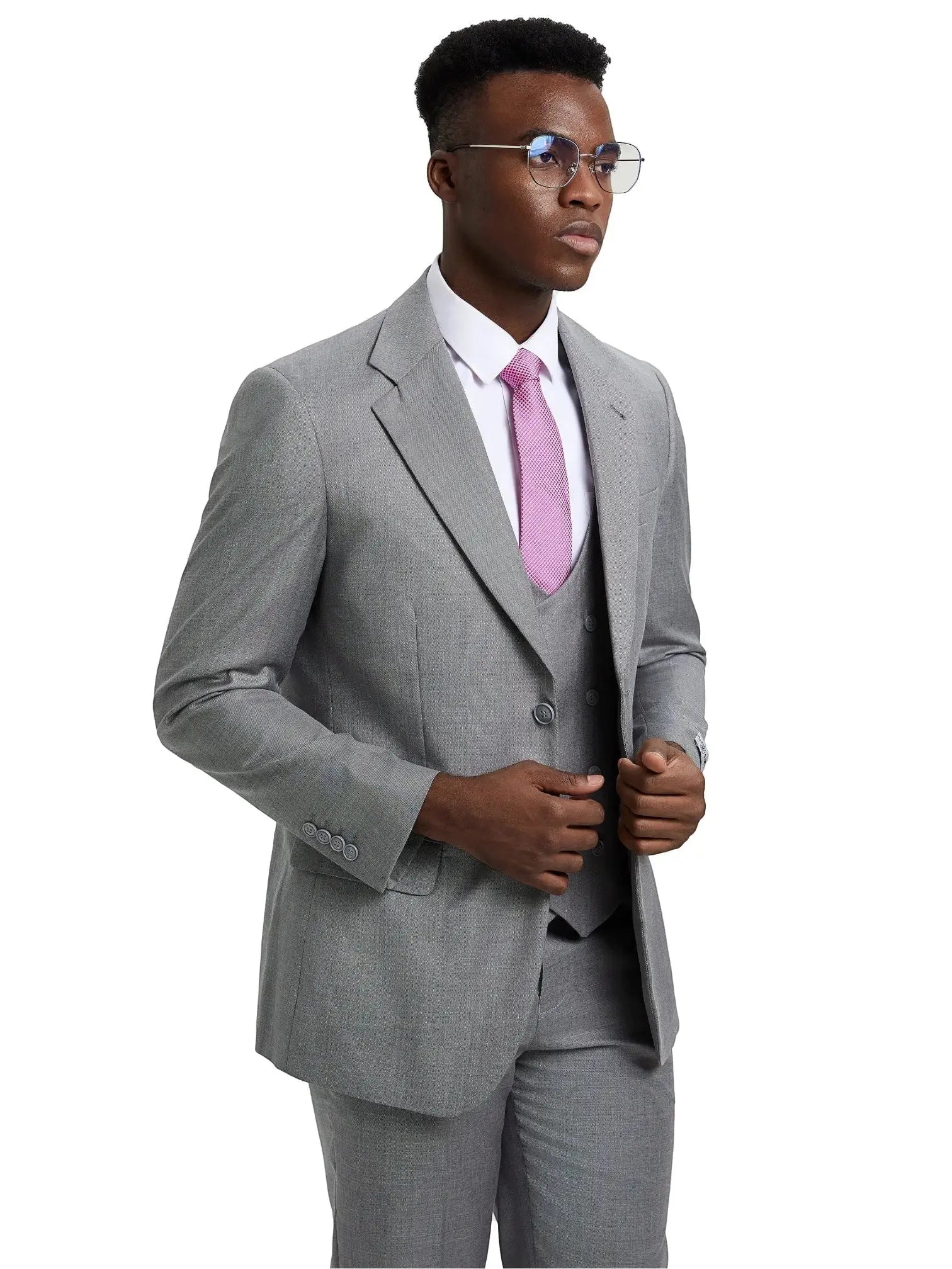Model wearing a grey M & R Clothing Stacy Adams sharkskin 3-piece suit with a white shirt and pink tie