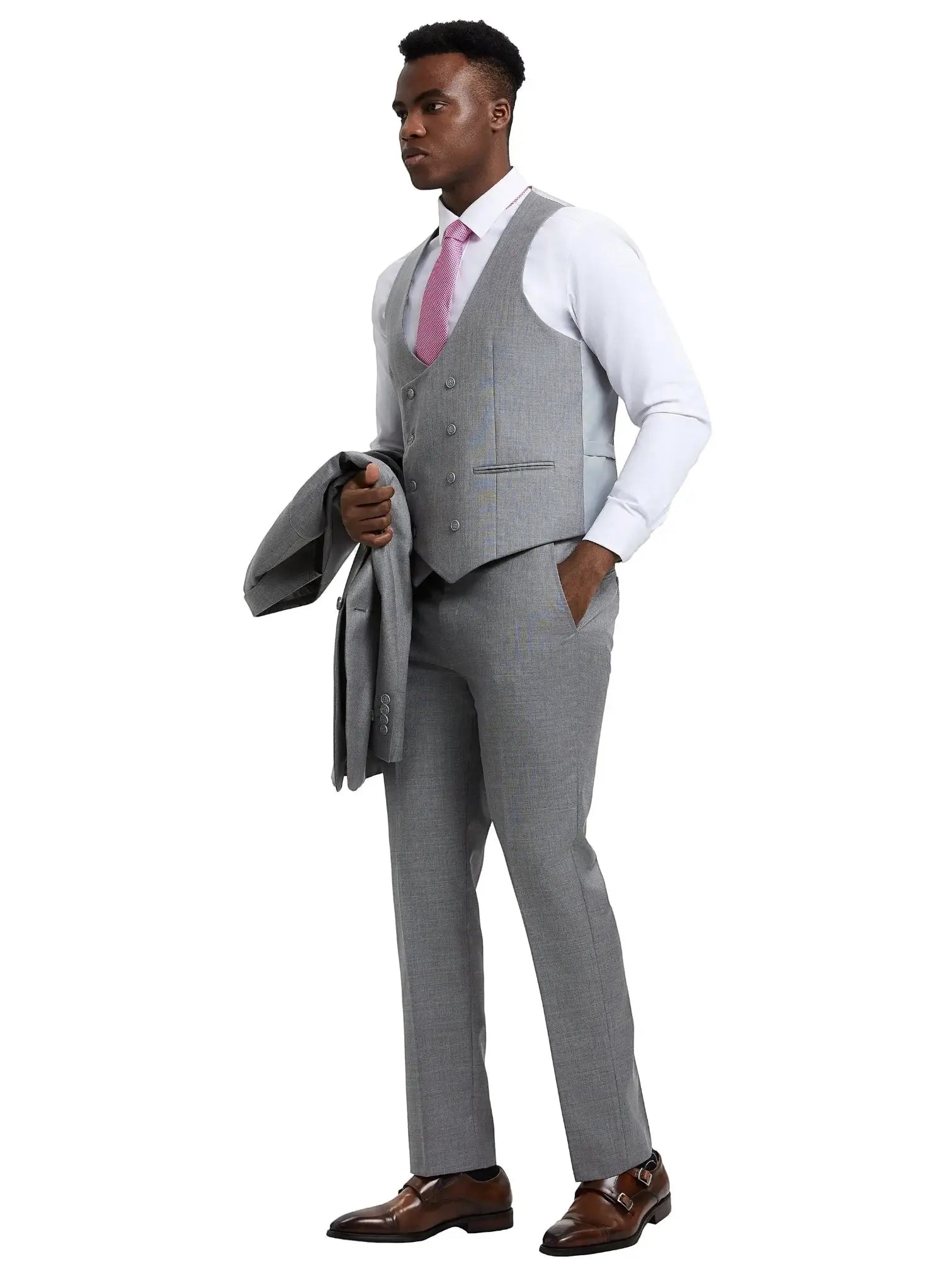 Model wearing a grey M & R Clothing sharkskin 3-piece suit with a white shirt, pink tie, and brown dress shoes.