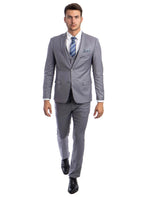 Model wearing a grey M & R Clothing skinny-fit 3-piece suit with a white shirt and blue striped tie