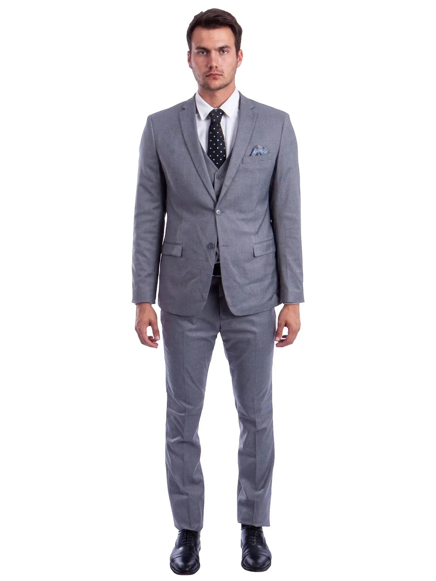 Model wearing a M & R Clothing grey skinny-fit 3-piece suit with a white shirt, black polka dot tie, and pocket square.