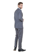 M & R Clothing Bryan Michaels grey tailored tuxedo jacket worn by a man looking over his shoulder, back view