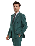 Model wearing a M & R Clothing hunter green pinstripe double-breasted slim fit suit with peak lapels.