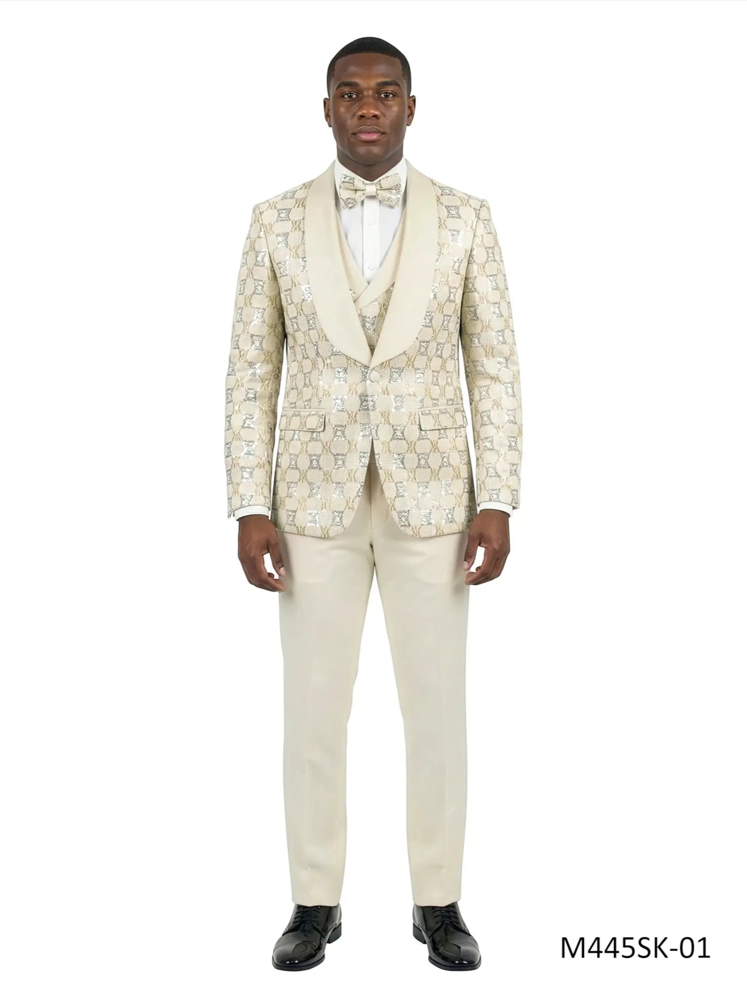 M & R Clothing 3-piece ivory chained sequin tuxedo suit with satin shawl collar, vest, and matching bowtie on a model