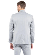 Back view of a man wearing a light grey M & R Clothing tailored-fit tuxedo jacket with a clean, structured design.