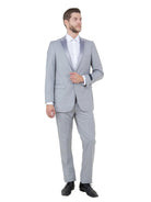 M & R Clothing Bryan Michaels light grey tuxedo with a single-button closure and satin peak lapel worn by a model.