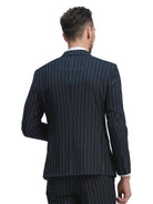 Back view of a M & R Clothing slim fit navy pinstripe double breasted suit jacket worn by a man