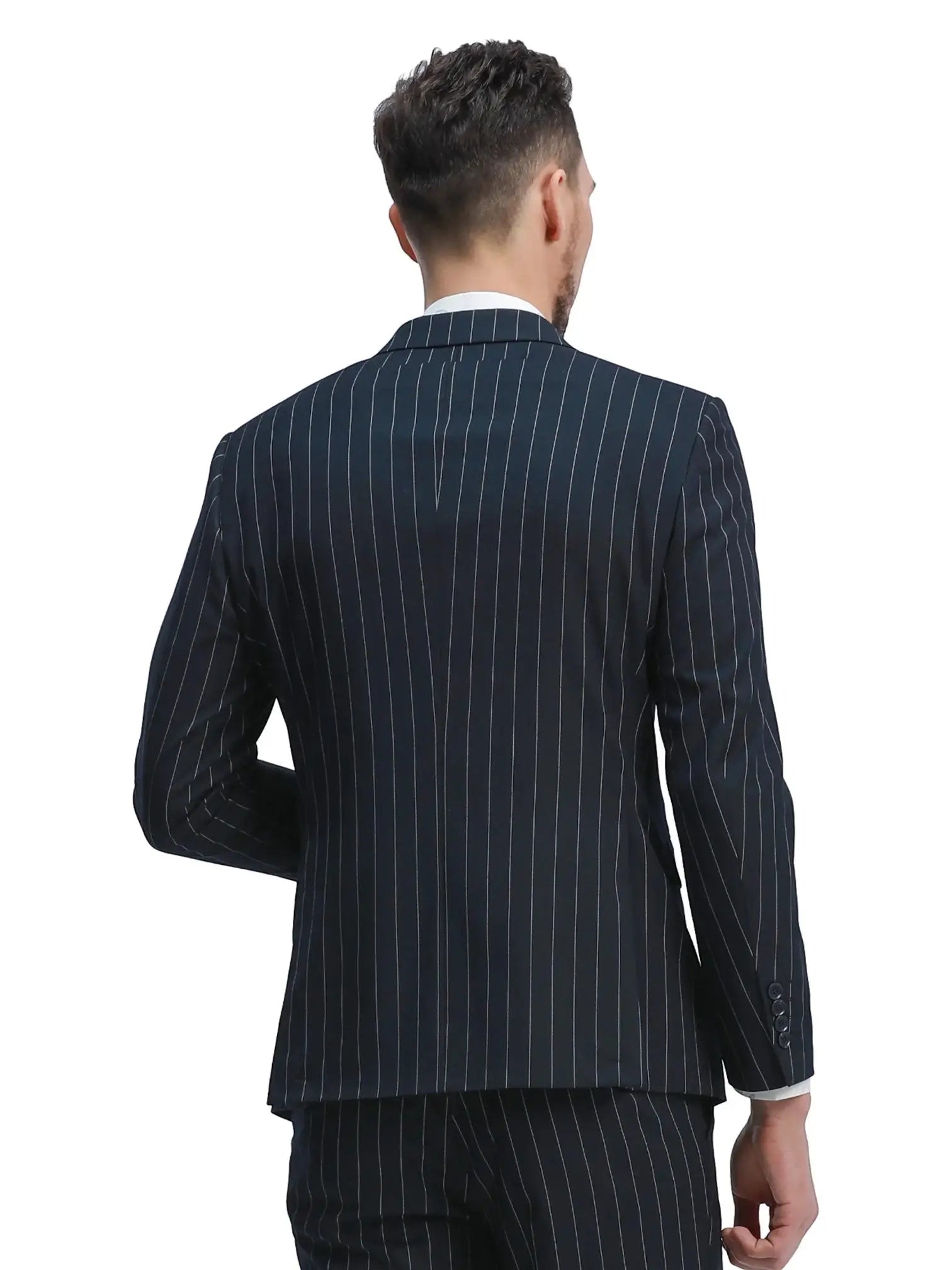 Back view of a M & R Clothing slim fit navy pinstripe double breasted suit jacket worn by a man