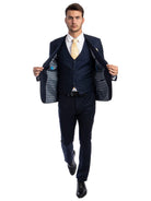 M & R Clothing men's navy skinny-fit 3-piece suit with a matching vest, white shirt, and patterned yellow tie.