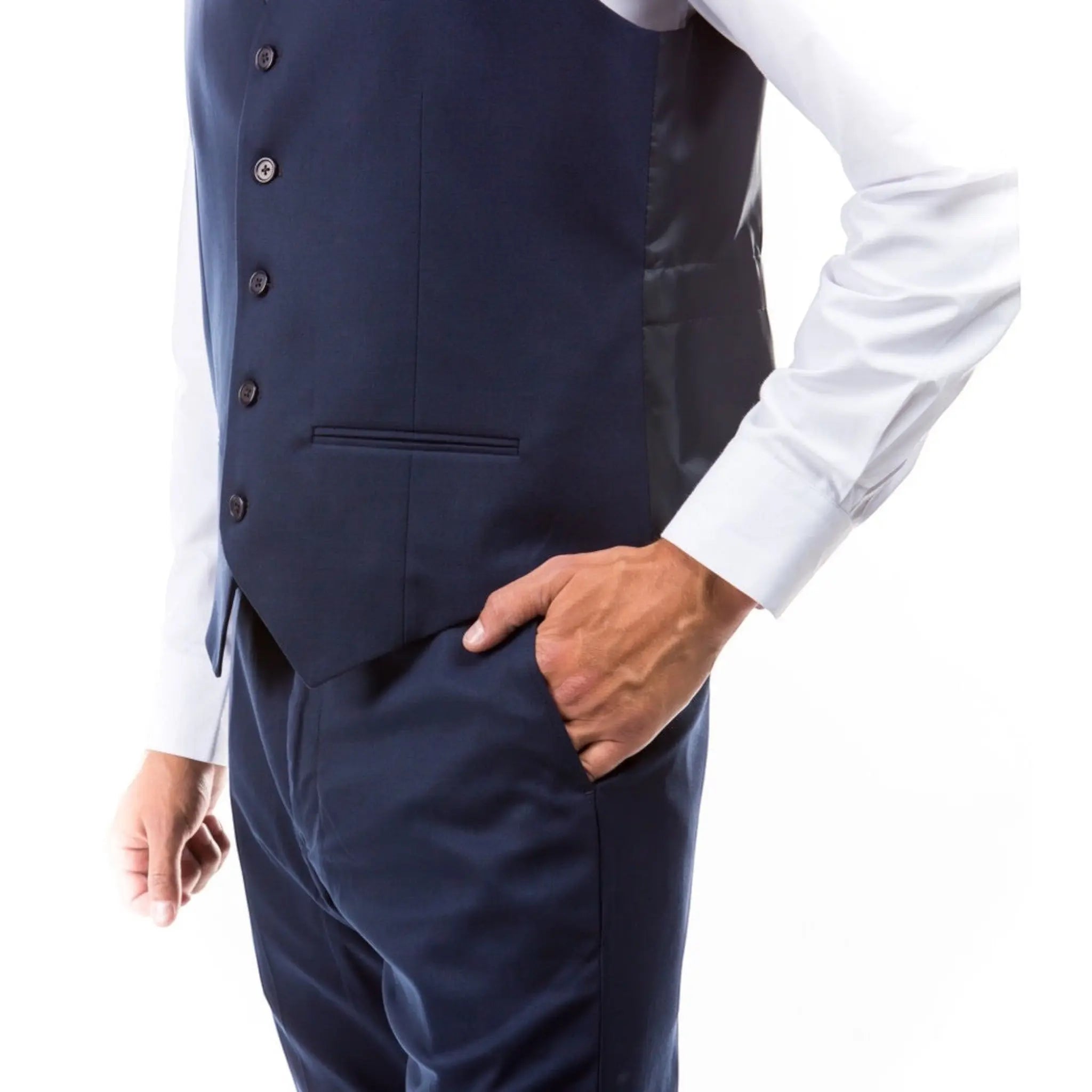 M & R Clothing navy blue single-breasted suit vest worn over a white dress shirt with a hand in the pocket