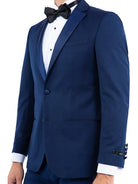 M & R Clothing navy tailored-fit tuxedo jacket featuring a satin notch lapel and black bow tie on a model