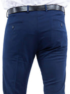 M & R Clothing Zegarie navy blue formal tuxedo dress pants with a black belt, viewed from the back.