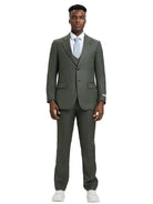 Model wearing a M & R Clothing Stacy Adams olive green sharkskin 3-piece suit with a vest, jacket, and tailored pants.