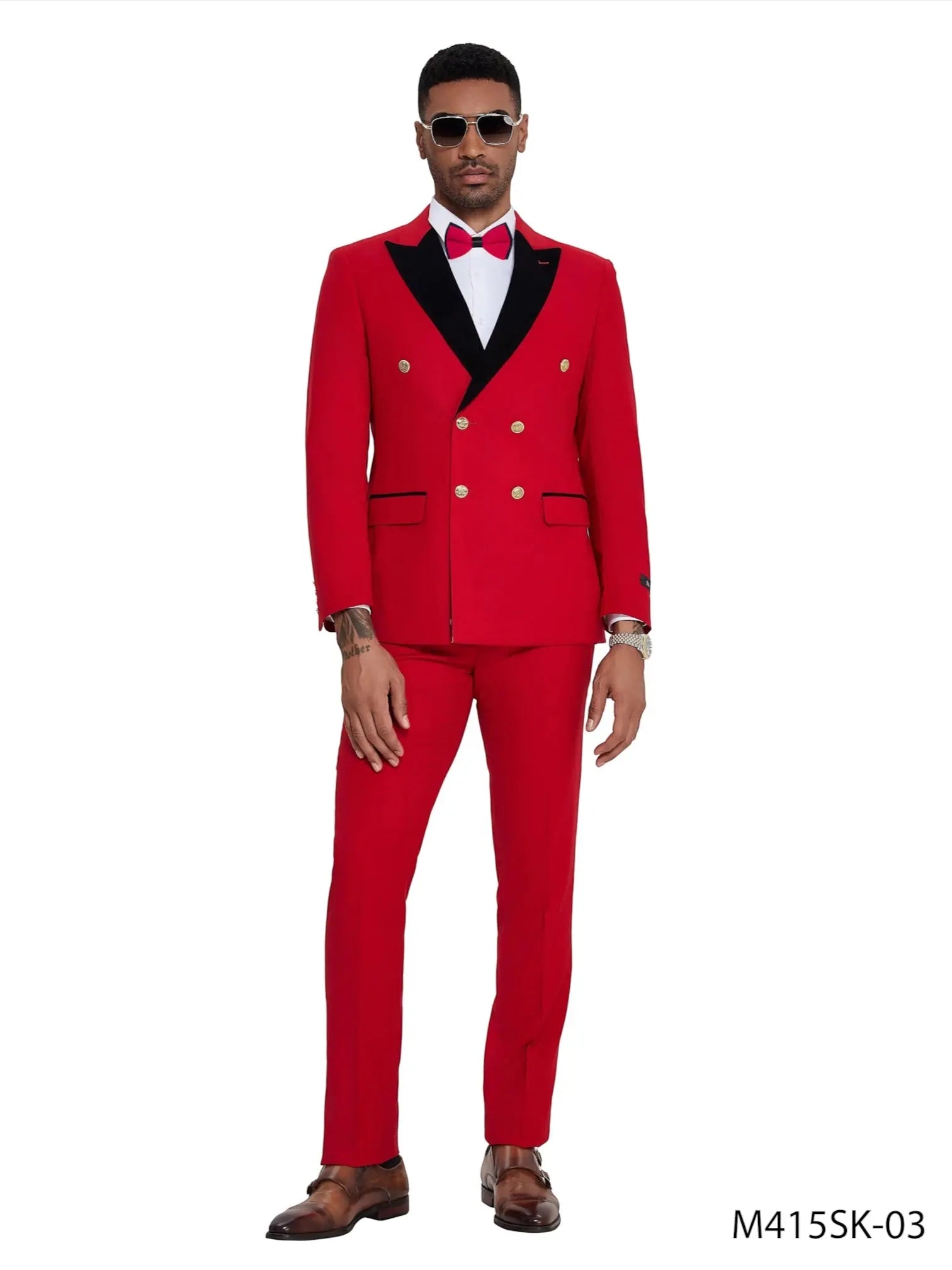 M & R Clothing Tazzio red double-breasted suit with black satin peak lapels and gold buttons worn by a male model.