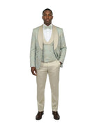 Model wearing a M & R Clothing 3-piece sage jacquard tuxedo with a double-breasted vest and satin shawl collar.