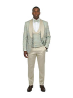 Model wearing a M & R Clothing 3-piece sage jacquard tuxedo with a double-breasted vest and satin shawl collar.